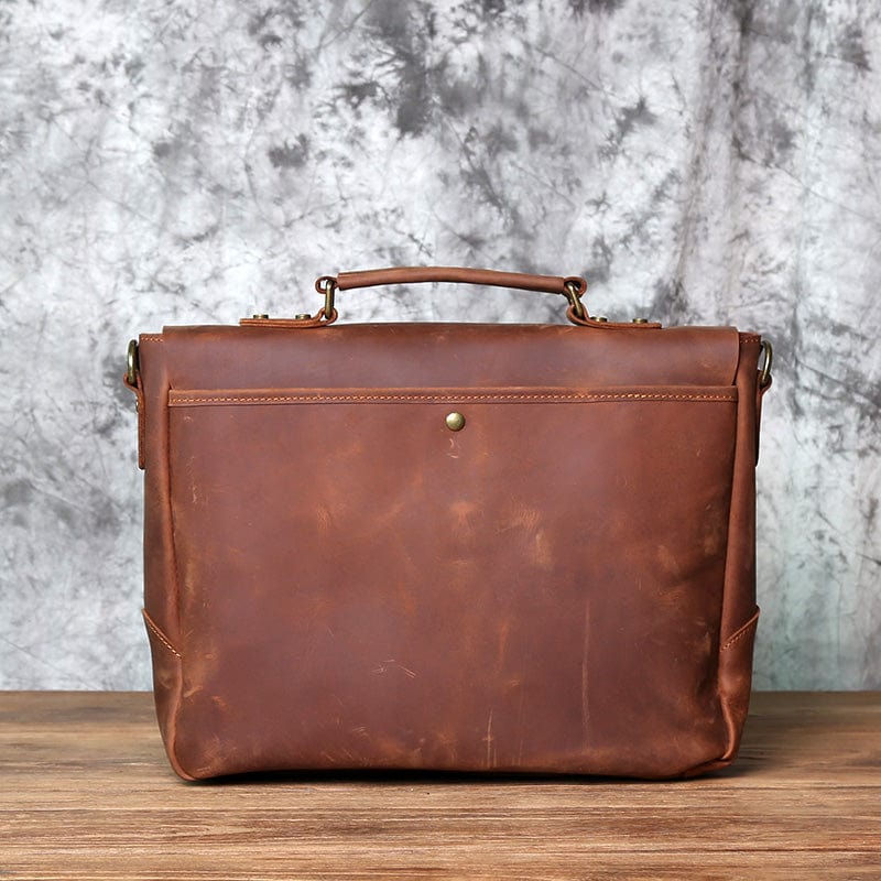 Accessoire de maroquinerie homme : sac en cuir pour travail, style classique et intemporel, grande capacité.