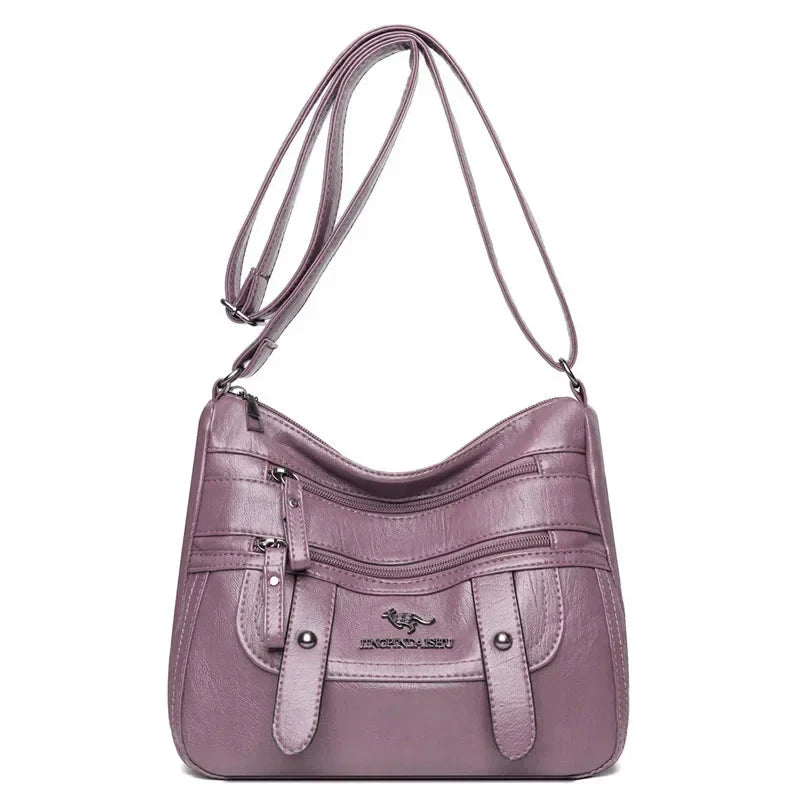 Sac polyvalent en cuir pour femme, style chic et moderne, idéal comme sac bandoulière élégant.