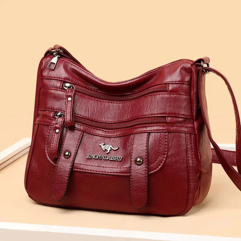 Sac bandoulière femme en cuir doux, polyvalent et chic, idéal pour toutes les occasions de mode.
