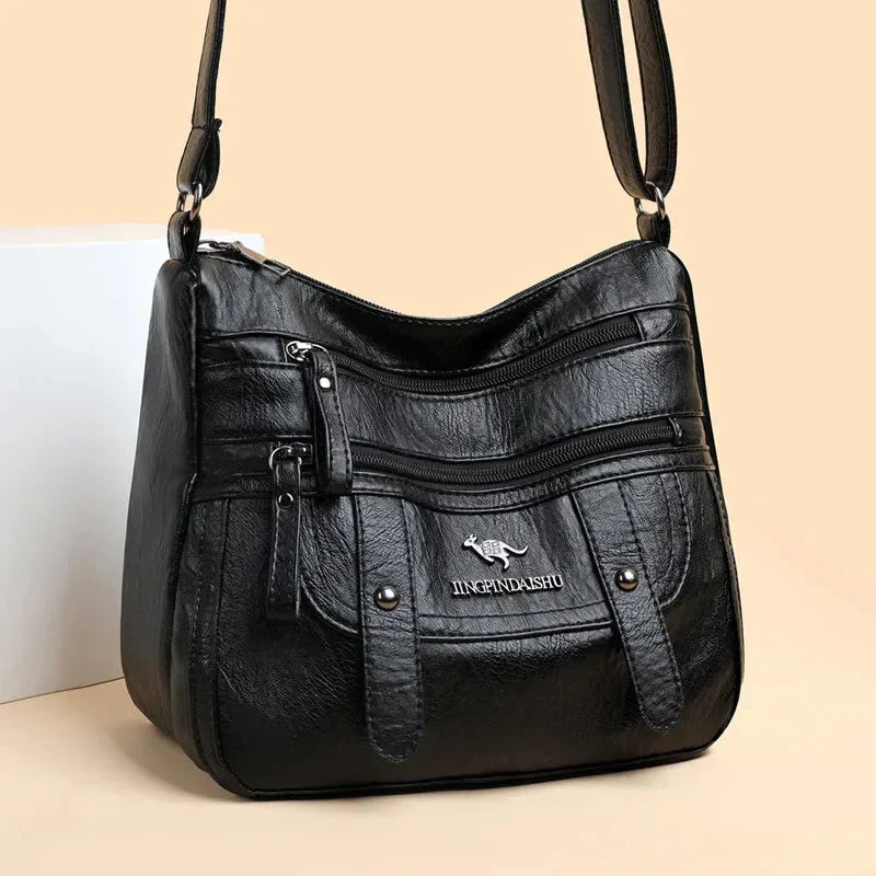 Sac femme en cuir doux, sac à main quotidien et polyvalent pour un look chic et décontracté.