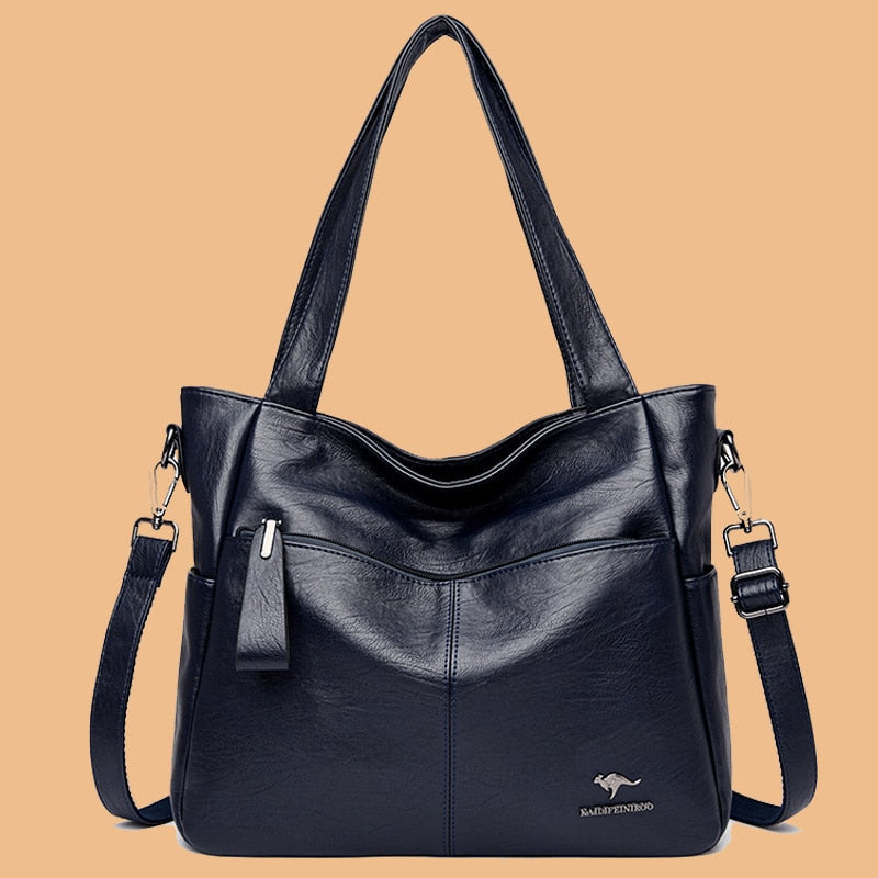 Sac à main élégant en cuir synthétique bleu marine pour femme, chic & polyvalent, avec bandoulière réglable.