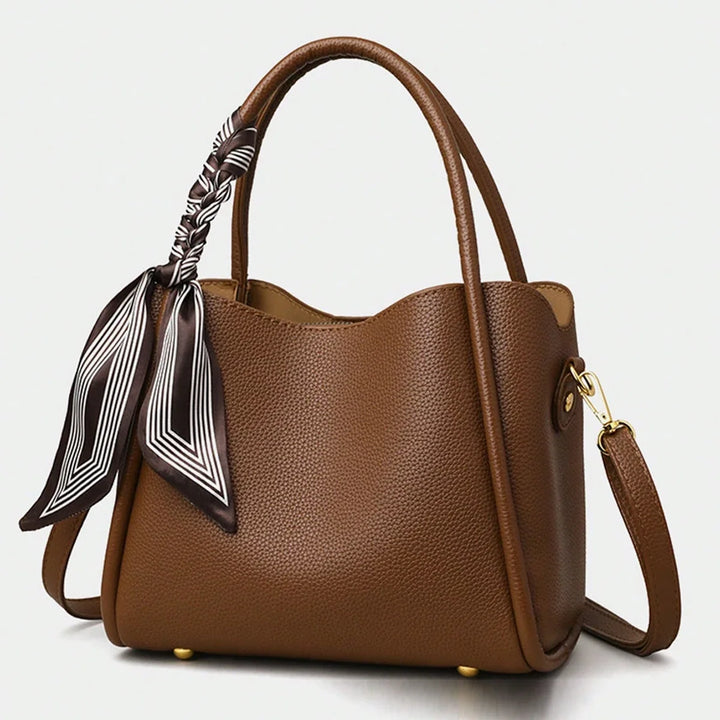 Sac femme marron chic en similicuir, sac à main tendance avec bandoulière ajustable pour toutes occasions.
