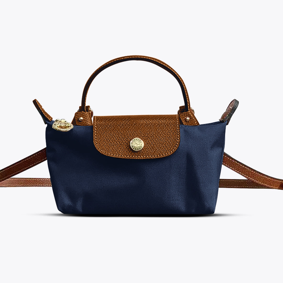 Sac à main élégant pour femme, polyvalent en cuir synthétique. Accessoire mode chic pour toutes les tenues.