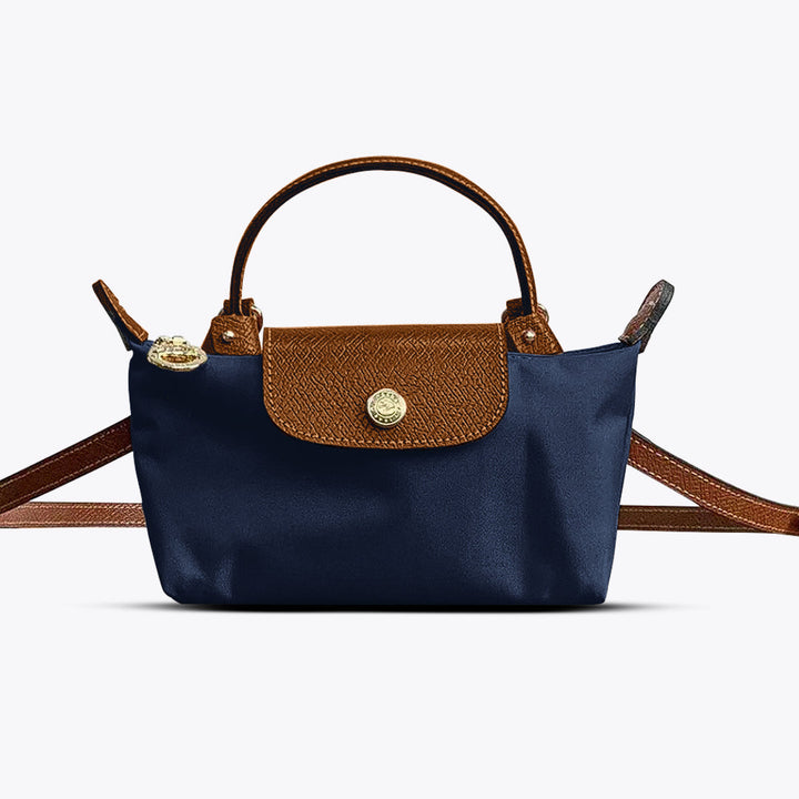 Sac à main élégant pour femme, polyvalent en cuir synthétique. Accessoire mode chic pour toutes les tenues.