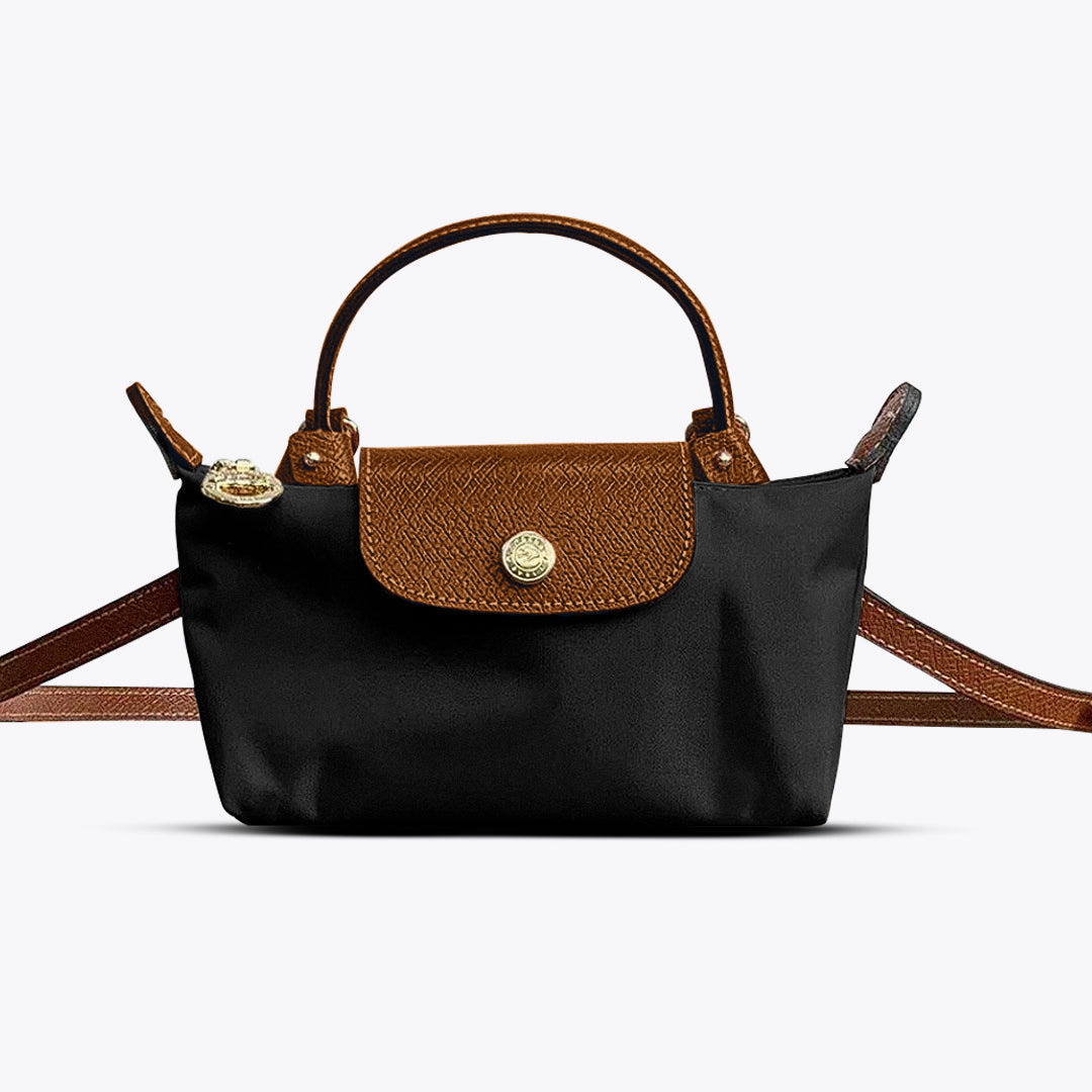 Sac femme en cuir synthétique à bandoulière, idéal pour le quotidien. Un accessoire de mode élégant et pratique.