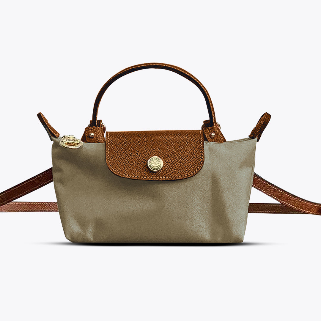 Sac élégant pour femme en cuir synthétique, adapté à diverses tenues. Votre accessoire mode essentiel au quotidien.