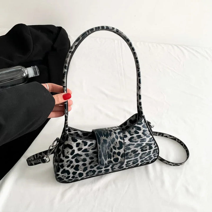 Sac à main léopard en cuir PU pour femme, motif animalier chic, idéal pour un look sophistiqué.