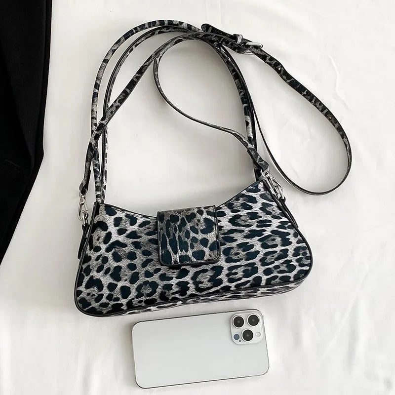 Élégant sac à main léopard en cuir PU pour femme, motif animalier raffiné, parfait pour toutes occasions.