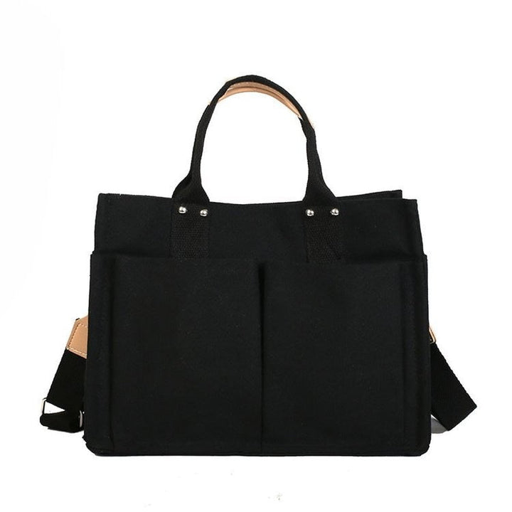Sac à main noir moderne et spacieux, accessoire de mode pour étudiant, idéal pour transporter des affaires scolaires