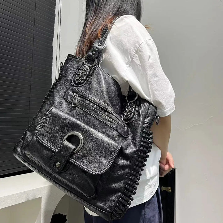 Sac à main noir femme avec organisateur interne, parfait pour travail et études. Solide et pratique.