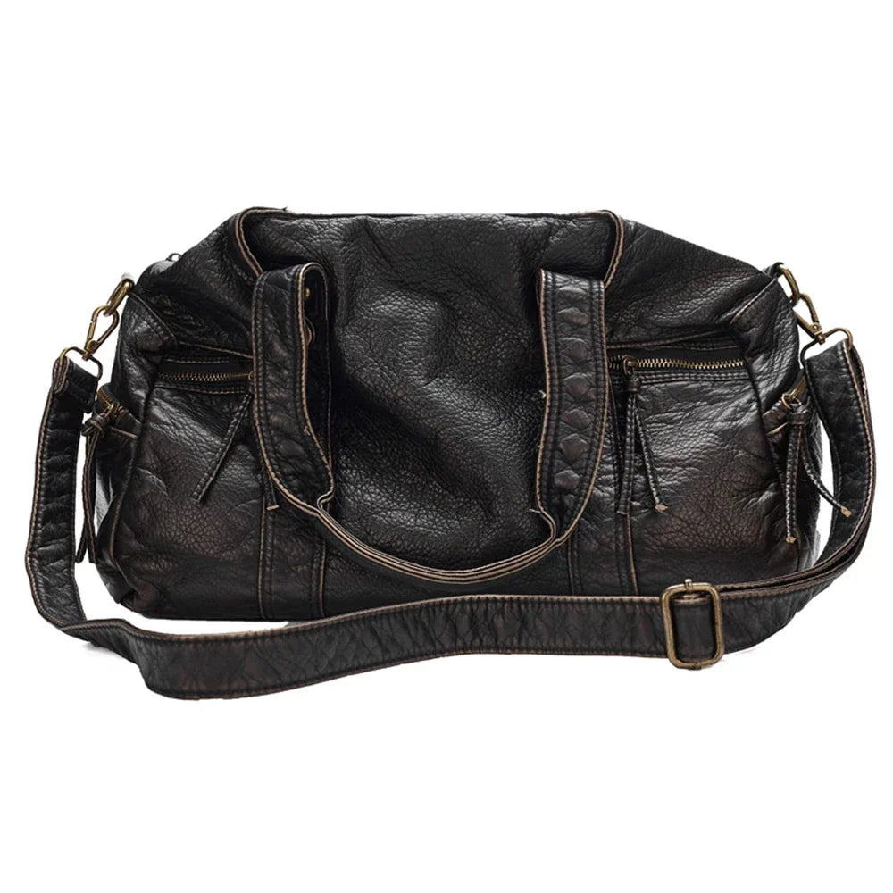 Sac à main noir chic pour femme, style vintage. Grand, pratique, en cuir synthétique. Idéal pour l'étudiante.