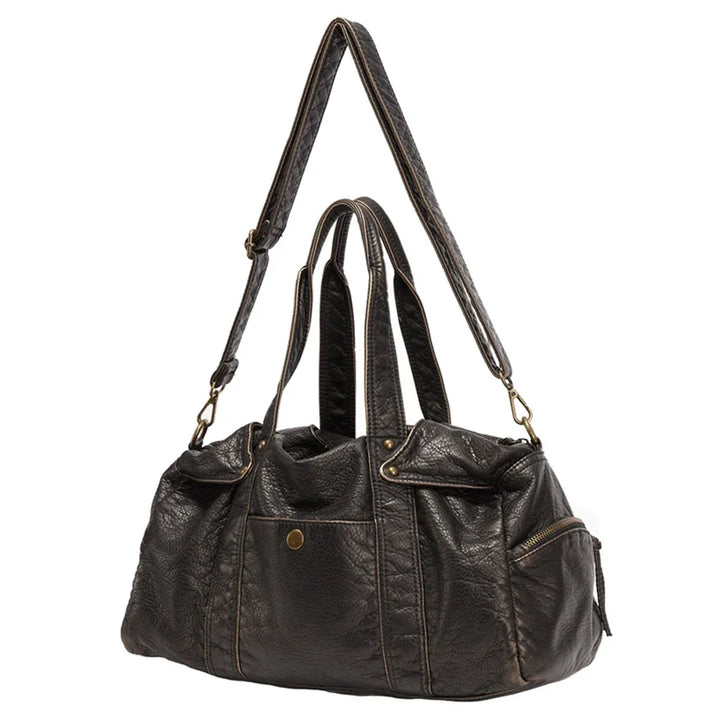 Sac à main noir élégant en cuir synthétique. Grand format, pratique et chic pour femme, étudiante et les cours.