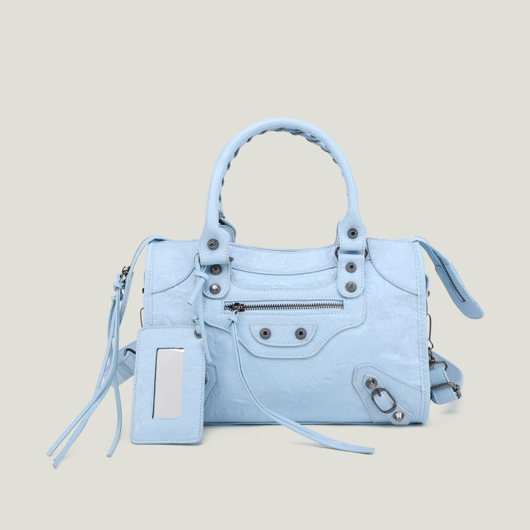 Sac bandoulière rouge, petit format, idéal pour l'essentiel.