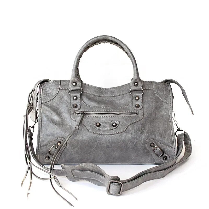 Sac femmes chic noir, cuir synthétique, double porté: main, épaule ou bandoulière.
