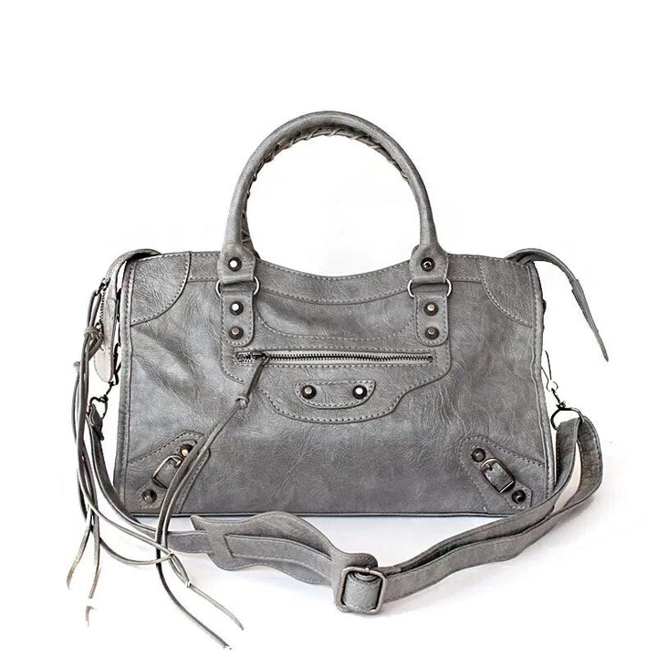 Sac femmes chic noir, cuir synthétique, double porté: main, épaule ou bandoulière.