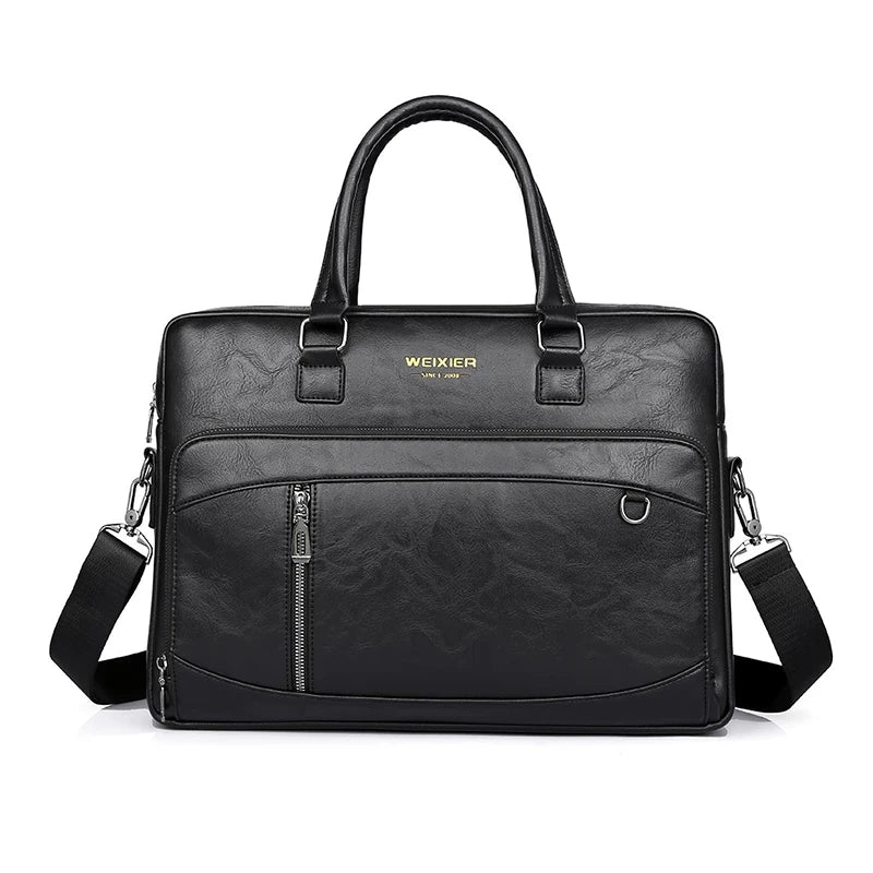 Sac ordinateur femme noir en cuir vegan, idéal pour le travail, avec bandoulière ajustable.