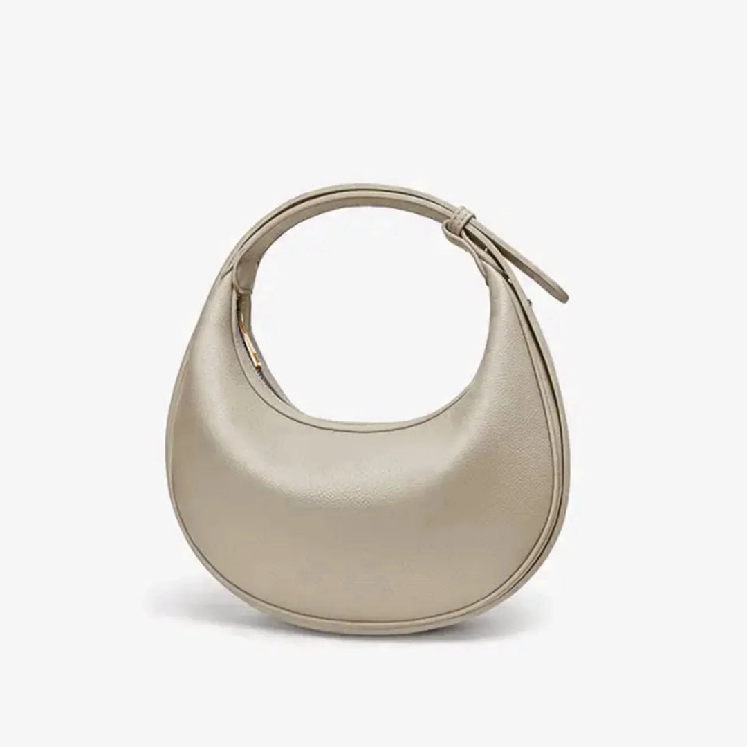 Sac bandoulière rond femme, accessoire mode chic et polyvalent.