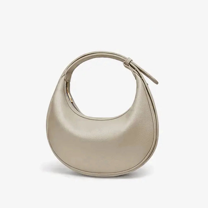 Sac bandoulière rond femme, accessoire mode chic et polyvalent.