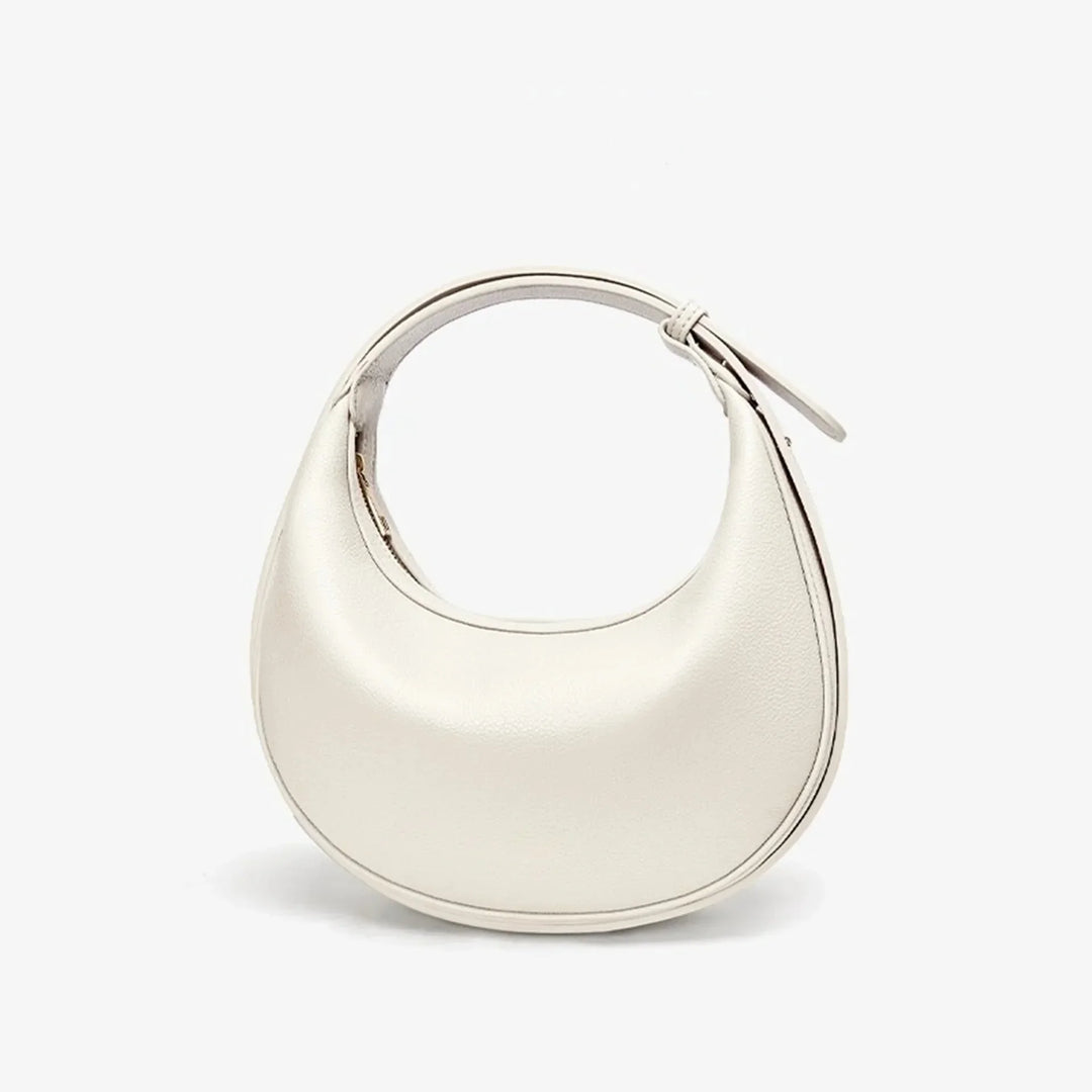 Sac à main rond en éco-cuir, design circulaire, un choix mode et respectueux.