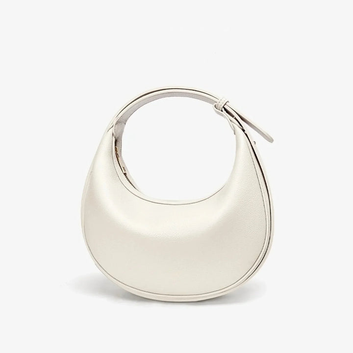 Sac à main rond en éco-cuir, design circulaire, un choix mode et respectueux.