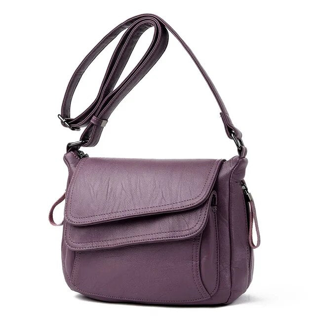 Grand sac à main femme en similicuir souple, pratique pour le travail ou les sorties quotidiennes.