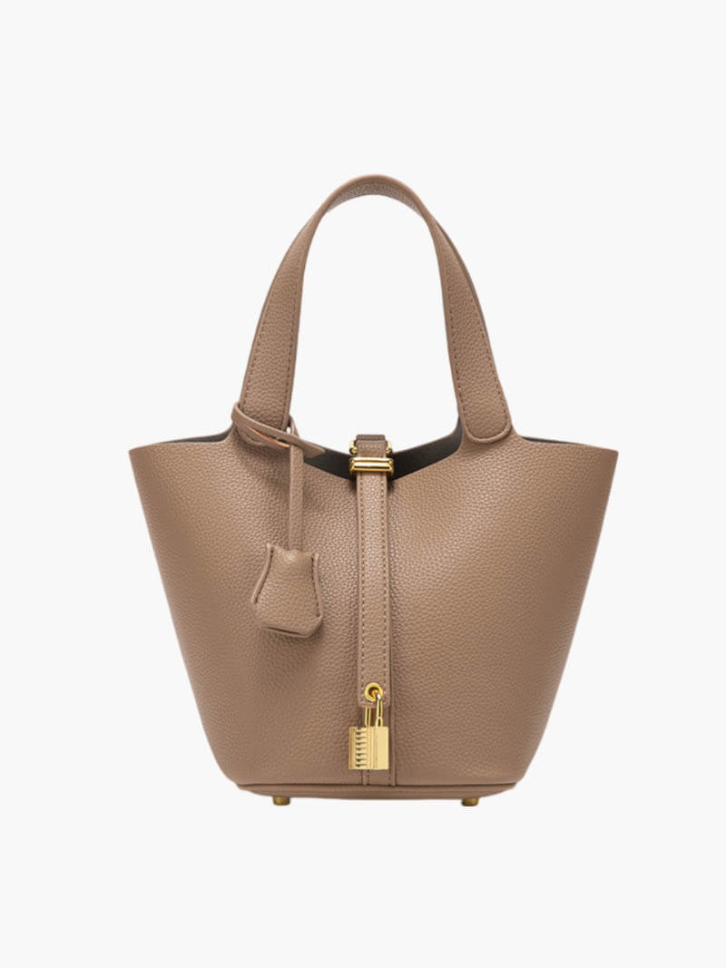 Sac à main en cuir structuré style fourre-tout pour femme. Idéal pour un look mode.