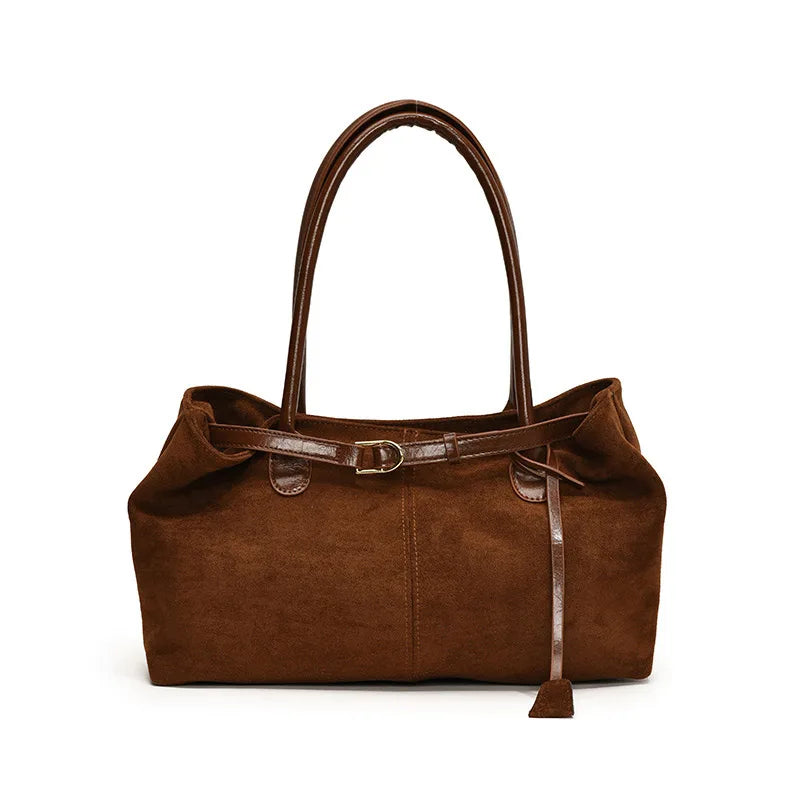 Élégant sac à main femme en suédine marron, style chic et sophistiqué.