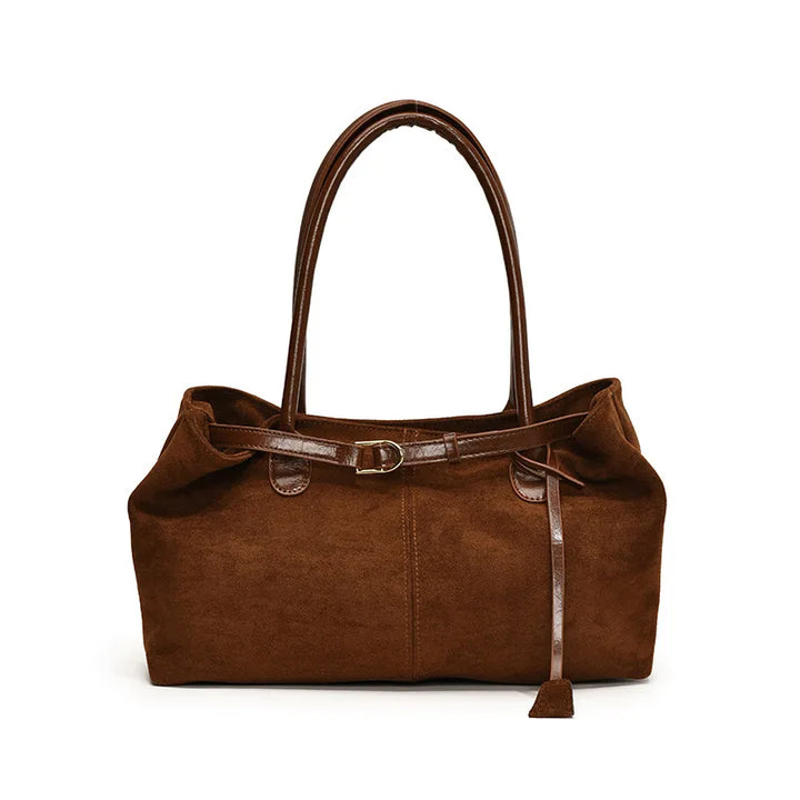 Élégant sac à main femme en suédine marron, style chic et sophistiqué.