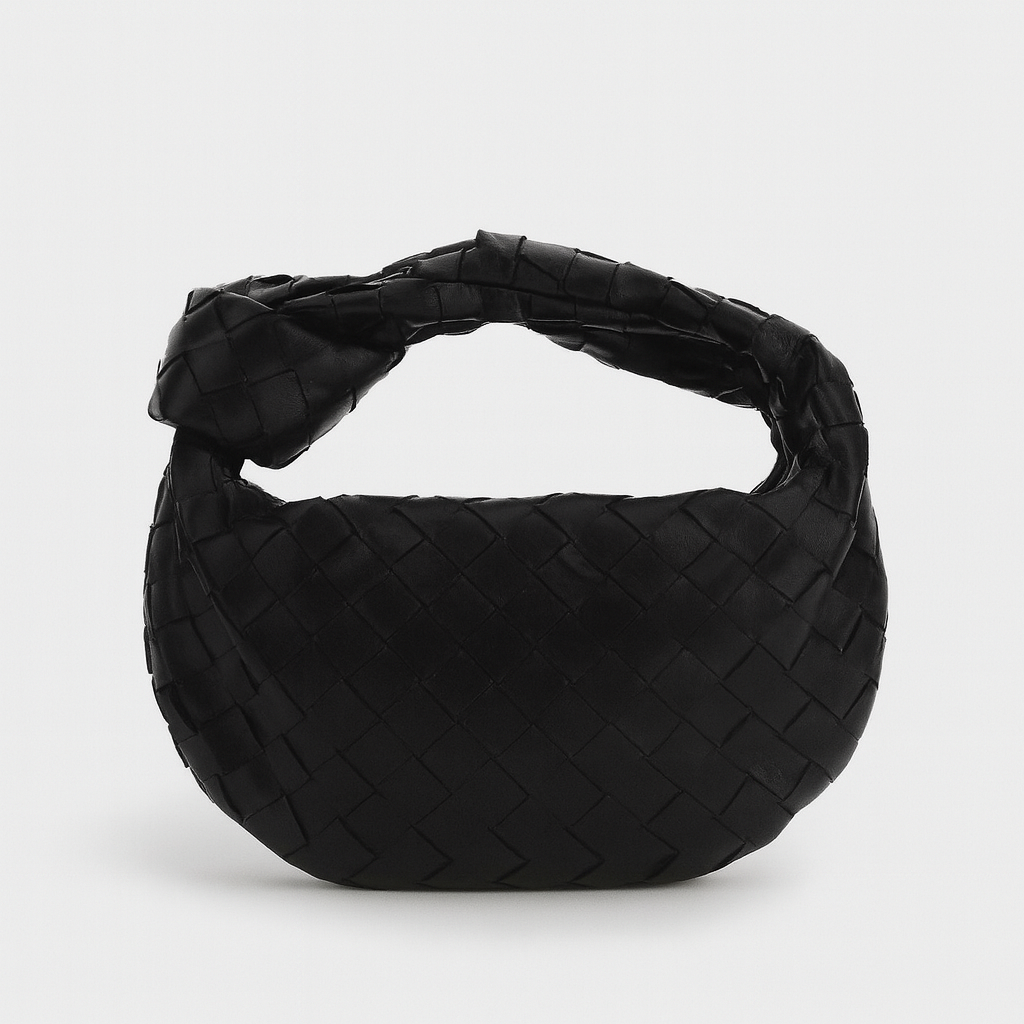 Sac à main tissé élégant en cuir synthétique pour femme. Accessoire mode chic et polyvalent.