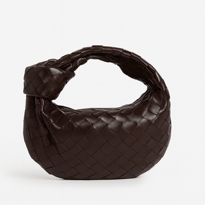 Sac à main femme élégant tissé, vue frontale. Cuir synthétique polyvalent, mode française chic.