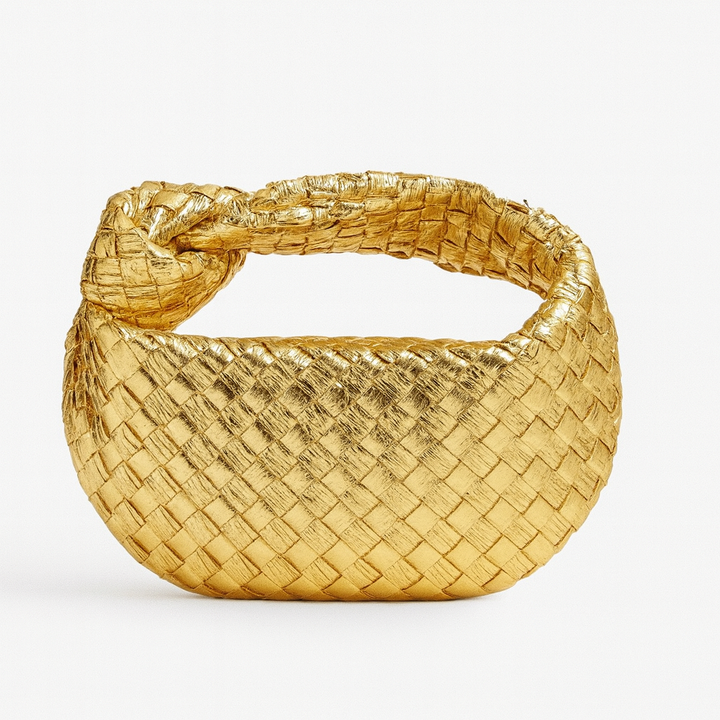 Sac à main élégant pour femme, design tissé. Modèle bandoulière en cuir synthétique, très chic.