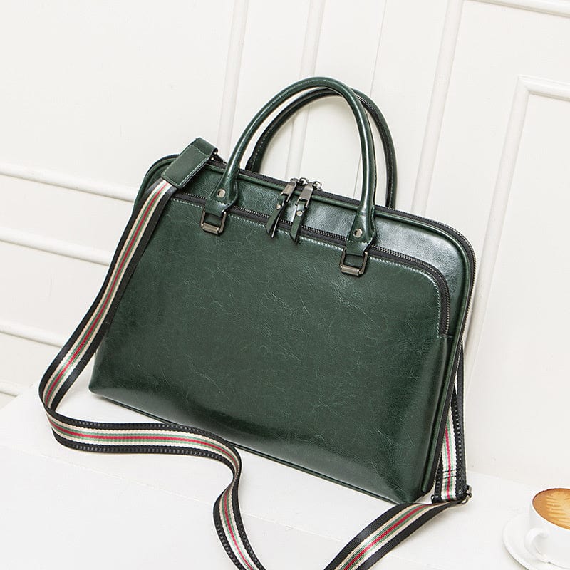 Sac élégant en cuir véritable pour ordinateur portable 14 pouces, idéal pour les femmes d'affaires.
