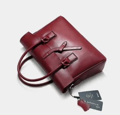 Sac Roxane en cuir véritable marron, capacité intérieur, accessoire femme élégant et fonctionnel.