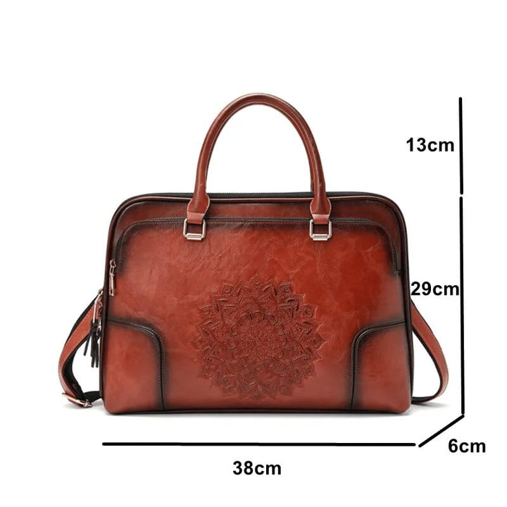 Sac à main Ximena rouge foncé, cuir fendu, style professionnel, idéal pour femme d'affaires avec PC portable.