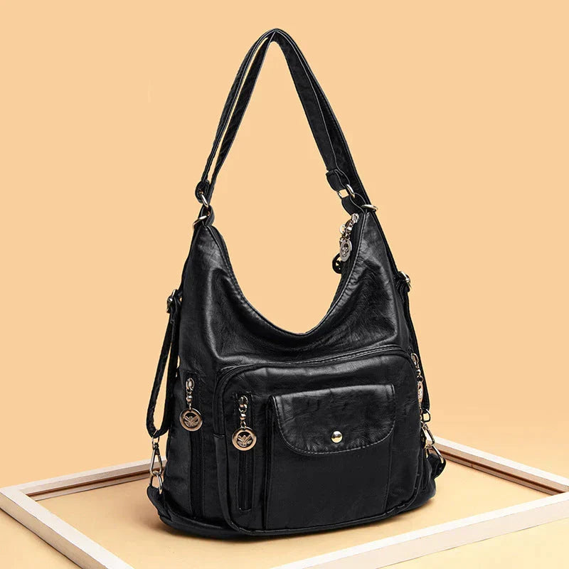 Sac bandoulière femme en cuir souple marron, versatile et chic, parfait pour le quotidien et les sorties.