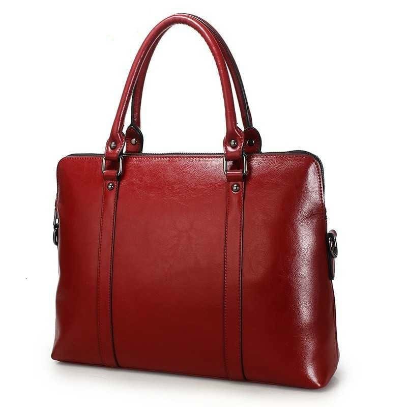 Sac PC Portable en cuir véritable pour femme élégante, bandoulière amovible, idéal travail.