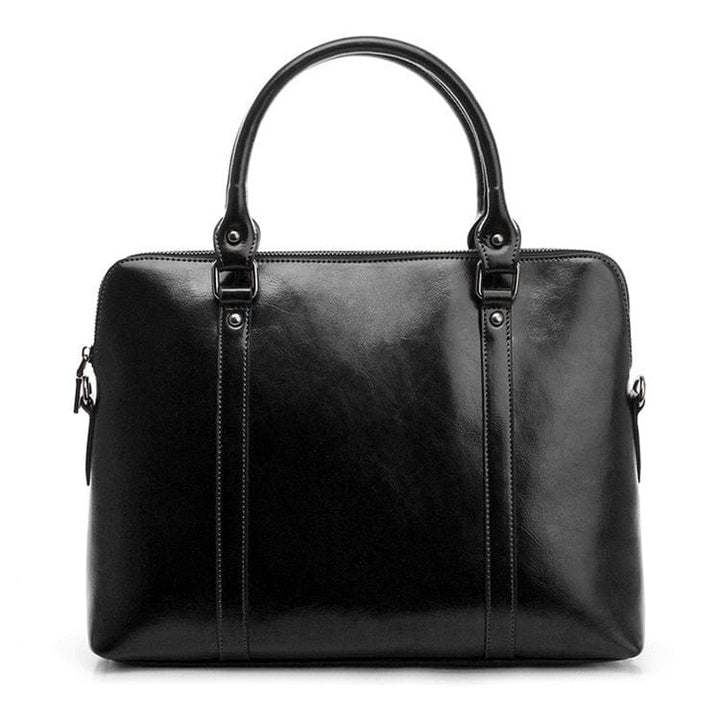 Sac ordinateur professionnel en cuir véritable noir pour femme, grand compartiment PC 15 pouces.