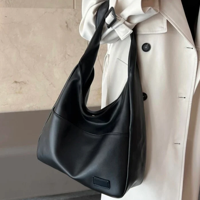 Élégant sac à main femme en similicuir, design moderne. Idéal comme sac porté épaule chic.