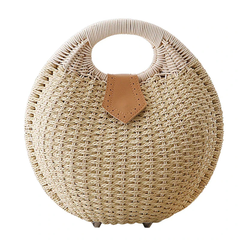 Sac rond en paille élégant pour femmes, idéal pour l'été, avec anse en rotin.