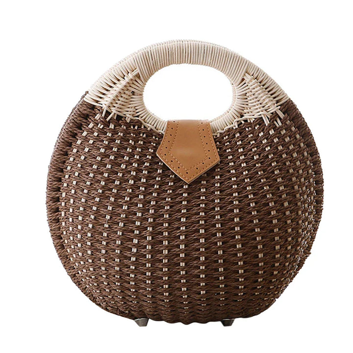 Sac femme en paille naturelle, forme circulaire, avec détails raffinés pour l'été.