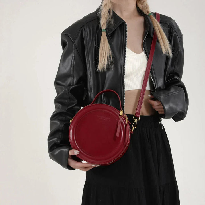 Sac rond élégant femme, bandoulière, cuir synthétique noir, accessoire mode chic