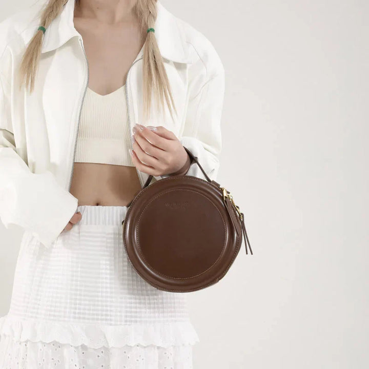 Sac à main rond femme couleur beige, bandoulière réglable, cuir synthétique, élégance quotidienne