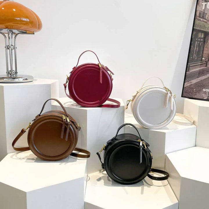 Sac rond femme ouvert, intérieur spacieux, bandoulière, cuir synthétique rouge, accessoire vibrant
