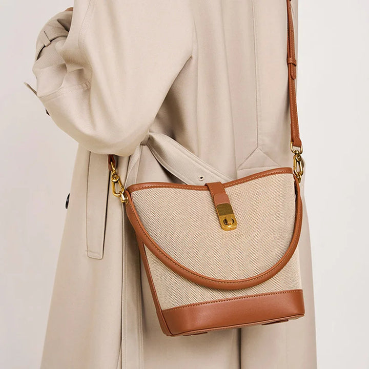 Sac à main seau polyvalent pour femme, avec bandoulière amovible, en matériaux durables, marron.