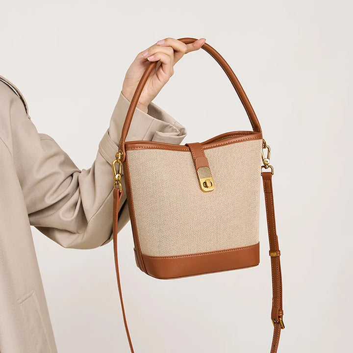 Sac seau femme en cuir synthétique de qualité, design intemporel, pour une touche d'élégance.
