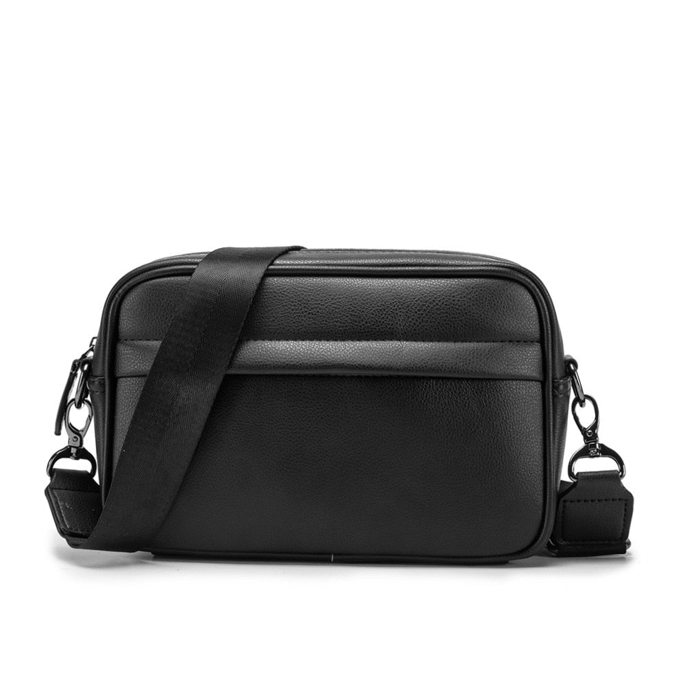 Sacoche bandoulière homme élégante à motif damier gris/noir. Accessoire mode urbain pratique et sécurisé pour voyage.