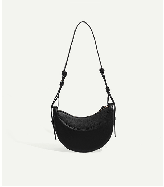 Sacoche femme en cuir, style minimaliste et élégant. Parfait pour un look sophistiqué et moderne.