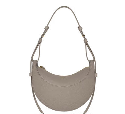 Sac à main femme en cuir, finition impeccable. Idéal pour le travail ou les sorties urbaines.