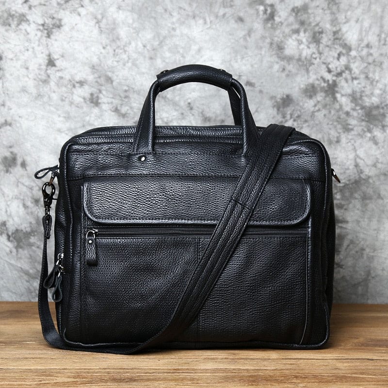 Sacoche ordinateur pour hommes en cuir veritable noir, parfait pour le travail et les affaires. Design elegant et fonctionnel.