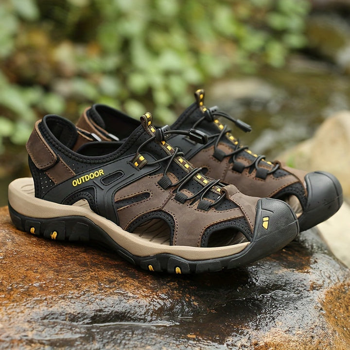 Sandales homme en cuir avec protection orteils, idéales pour randonnée et activités sportives.
